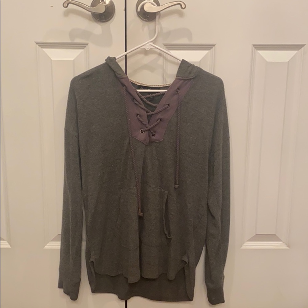 Grey long sleeve shirt with purple lace-up